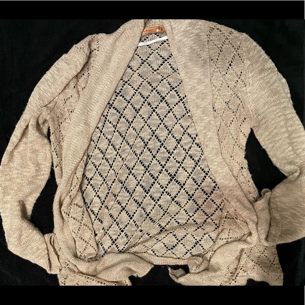Light neutral pink cardigan. In size small.